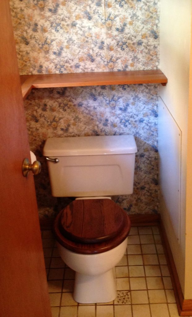 Before Picture of 70's Bathroom Toilet and Wallpaper