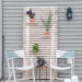 Outdoor Patio Makeover with Painted Chairs and Wood Slat Plant Wall