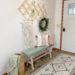 Coastal entryway with bench with Minwax Color of the Year Vintage Blue on it