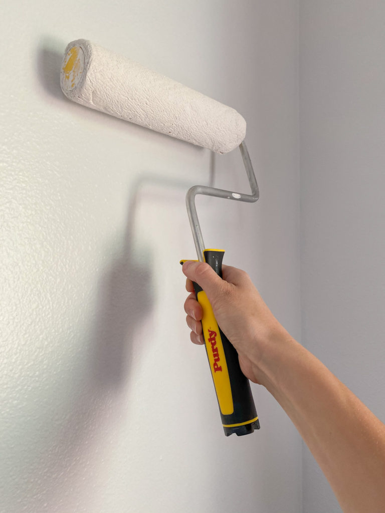 Using a Purdy roller on a wall 