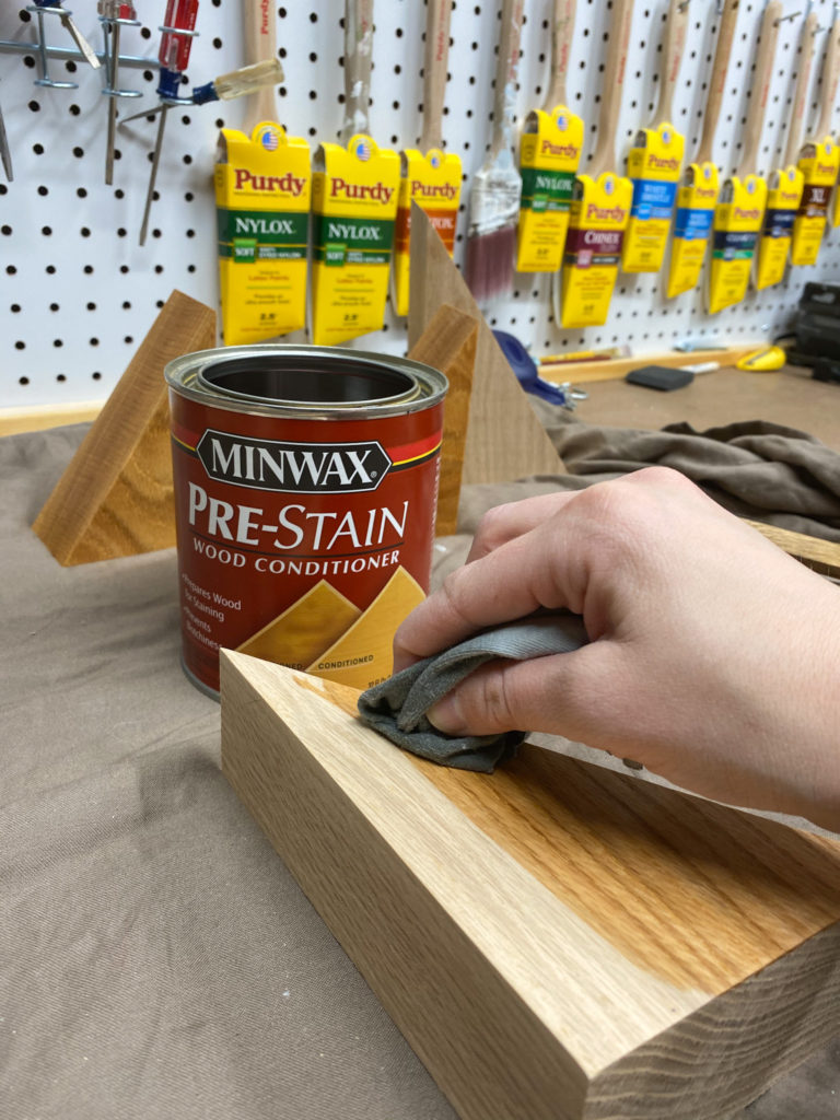 Applying Pre-Stain Wood Conditioner to Mountain Bookends