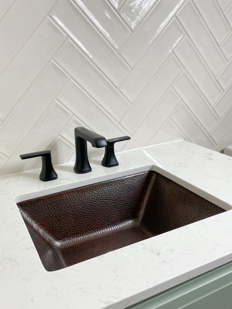 Installed bathroom sink, faucet and coutertop