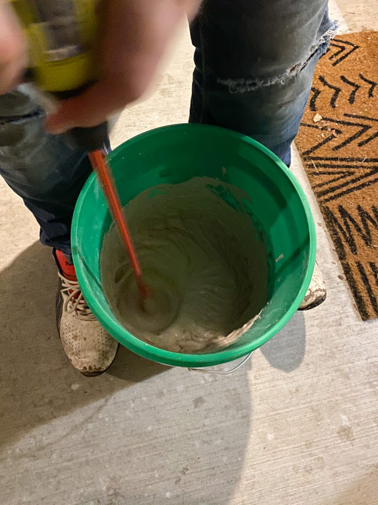 Mixing up grout for tiling
