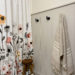 Finished Vertical Shiplap Wall in Bathroom with Floral Curtain
