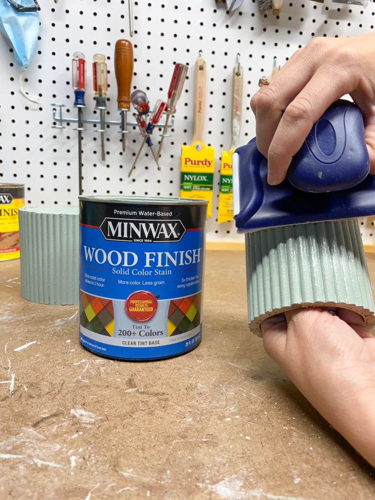 Applying Minwax solid color stain to diy dowel planters