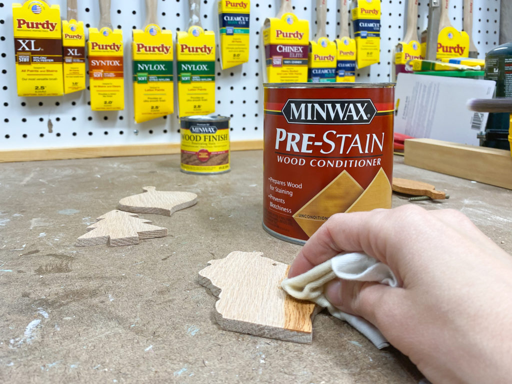 Applying pre-stain wood conditioner