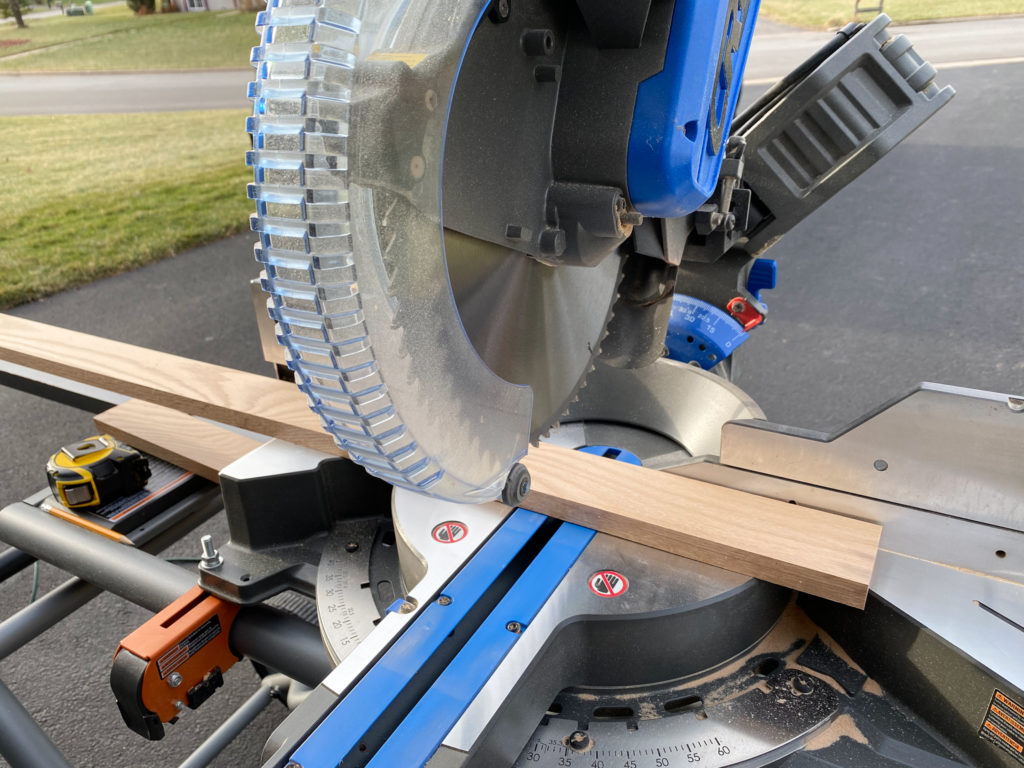 Cutting wood with miter saw